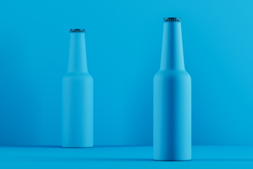 Two matt blue bottles over blue background