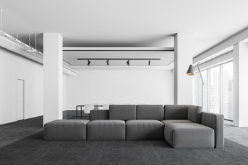 White office waiting room interior with sofa