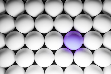 White balls background with purple ball, top view