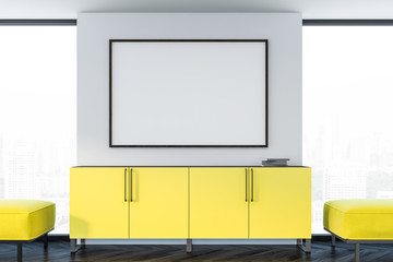Living room with yellow cabinet and poster