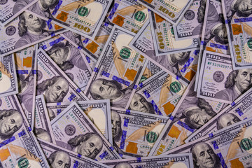 Fototapeta premium Background of the many american one hundred dollar banknotes