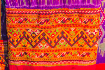 Beautiful patterned on the northern thai style garment and clothing for sale at the local flea market.