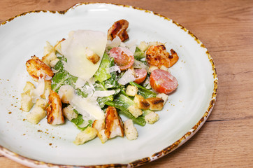Shrimp Caesar salad with Parmesan cheese, croutons and lettuce