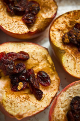 Baked apples with cinnamon and cranberries