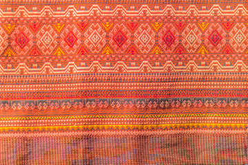 Beautiful patterned on the northern thai style garment and clothing for sale at the local flea market.
