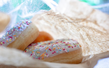 donuts bought in the bakery shop, packed in a paper-plastic bag