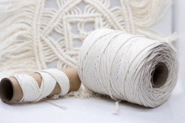 Fototapeta na wymiar Handmade macrame, needlework, knitting. Women's hobby. Macrame Home decor – Image