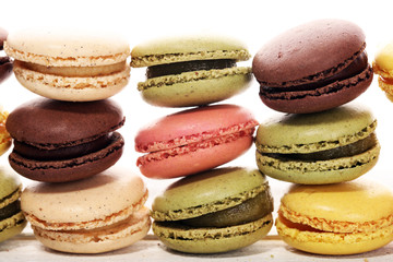 Sweet and colourful french macaroons or macaron on white background