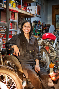 Portrait of female mechanics in workshop 
