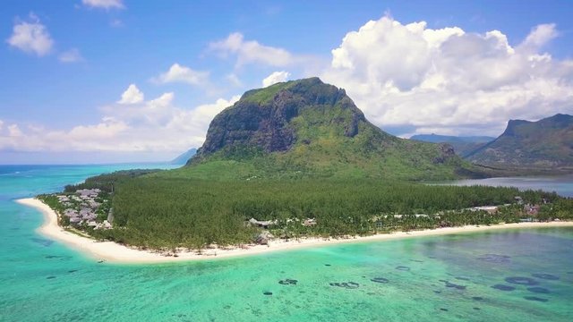 Aerial view of Le Morne in Mauritius. Flight along the beach with a view of the beautiful mountain.