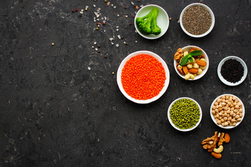concept of healthy food (legumes, greens, spinach, lentils and other) superfood. Food background
