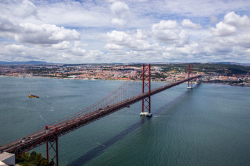 Panoramic view of Ponte 25 de Abril, long bridge in Lisbon