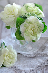 Beautiful bouquet of spring flowers in a vase on the table. Lovely bunch of flowers .Flowers of...