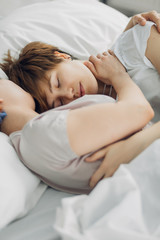 lesbian love. lesbianism, two close sisters sleeping on the bed, resting time, weekend