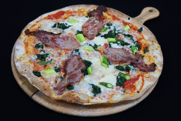 Thin crust florentine pizza with bacon and spinach