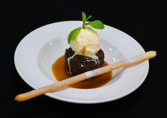sticky toffee pudding with vanilla ice cream and caramel sauce