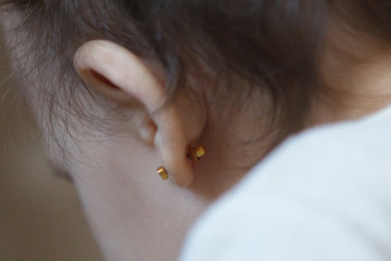 ear piercing for small children, one year old child