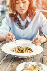 Asian women eating