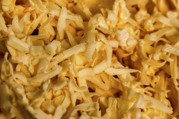 butter on the grater, making shortbread dough