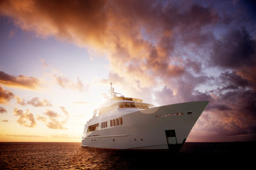 Yacht on sea at sunset 