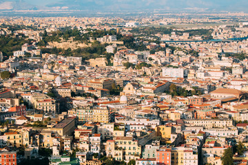 Fototapeta na wymiar Naples, Italy. Top View Cityscape Skyline With Famous Landmarks In Sunny Day. Many Old Churches And Temples