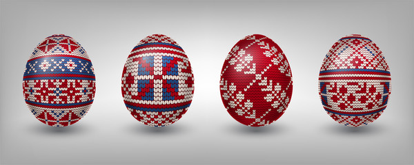 Paschal eggs decorated with red knitting patterns