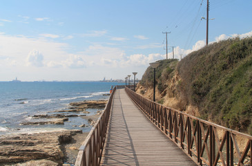 Fototapeta premium Wooden footbridge on a seafront