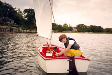 Portrait of boy sailing 
