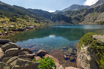 Summer landscape of Banderitsa Fish lake and Banderishki chukar peak, Pirin Mountain, Bulgaria