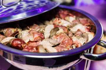 rolls in bacon in metal bowl