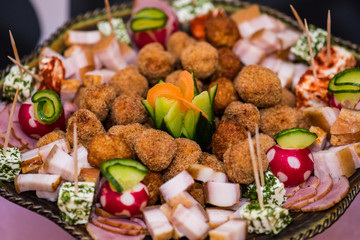 appetizers with meatballs, ham and fresh vegetables