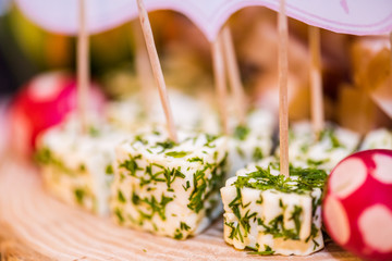 canape with cheese and basil