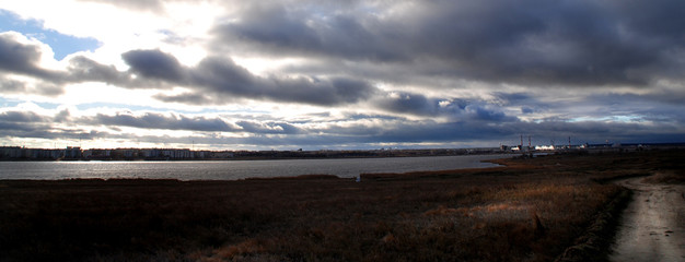the wind at the autumn city lake