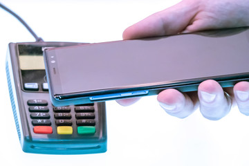 NFC payment. Contactless payment by smartphone. Online transactions. Electronic money.