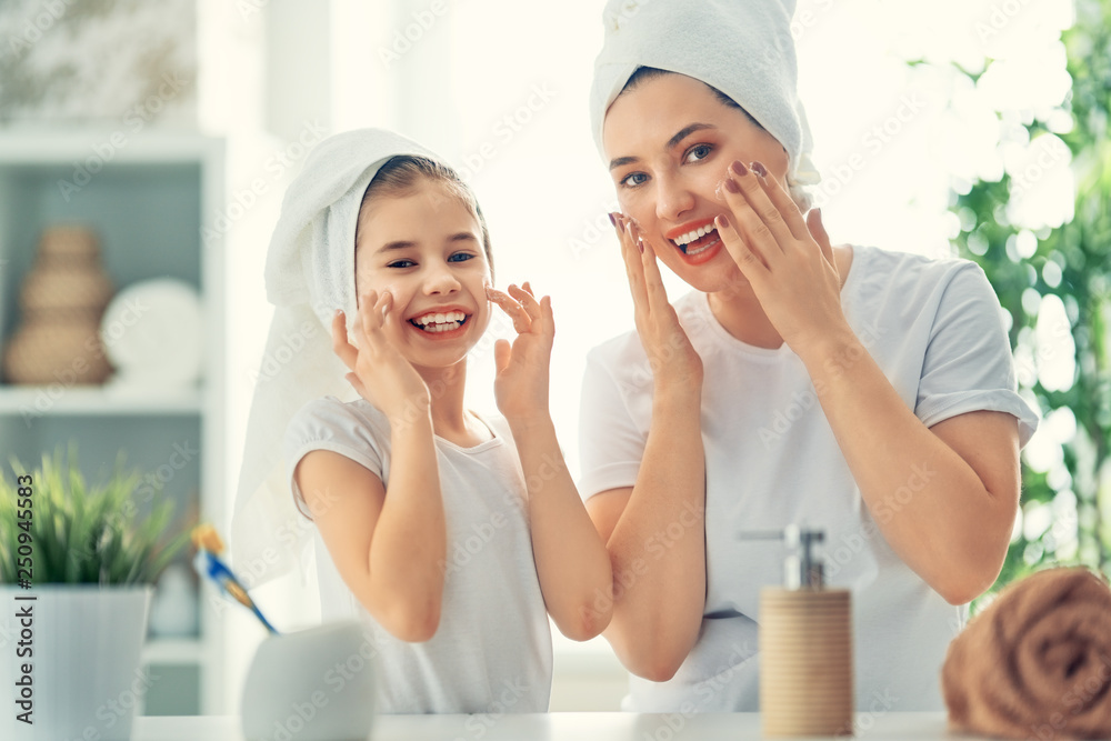 Poster Mother and daughter caring for skin