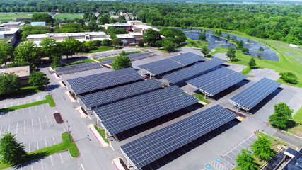 aerial view of solar panels installed in parking