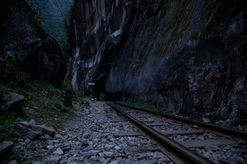 Fototapeta na wymiar night,train,Hydroelectric route to Aguas Calientes, train tracks,Machu Picchu, Peru