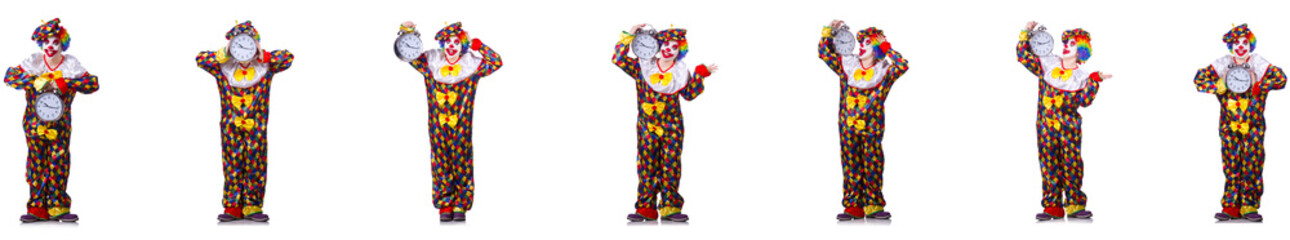 Funny male clown with alarm-clock 