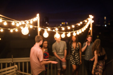 Illuminated fairy lights at party 