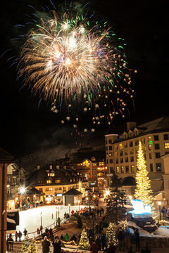 Fireworks over town and ice skating rink 