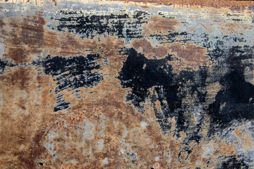 Old metal panel covered in rust