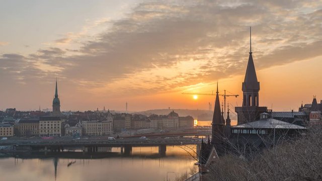 Stockholm Sweden time lapse 4K, city skyline sunrise timelapse at Gamla Stan and Slussen