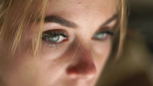 Close up female face, skin, eyes, eyelashes and eyesbrows. Natural beauty and makeup. Portrait looking woman.