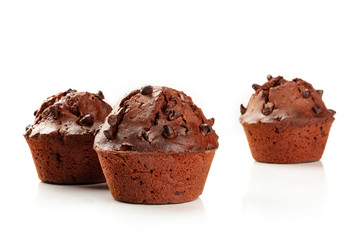 Chocolate chip muffins on a white background with a place for text