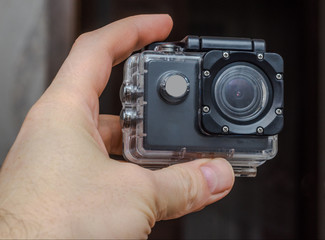 Underwater Box Action Camera in the hand of man