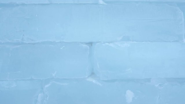 Ice brick wall texture using as background, close-up view.