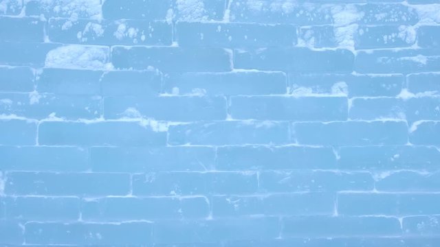 Ice brick wall texture using as background, close-up view.