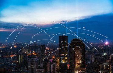 5G network wireless systems and internet of things with modern city skyline