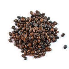 Roasted coffee beans isolated on white background.