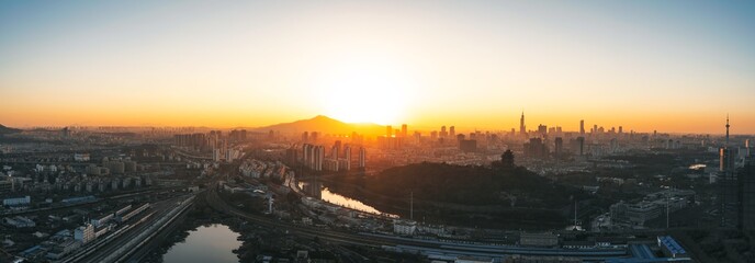 Fototapeta na wymiar Panorama view of urban city sunrise